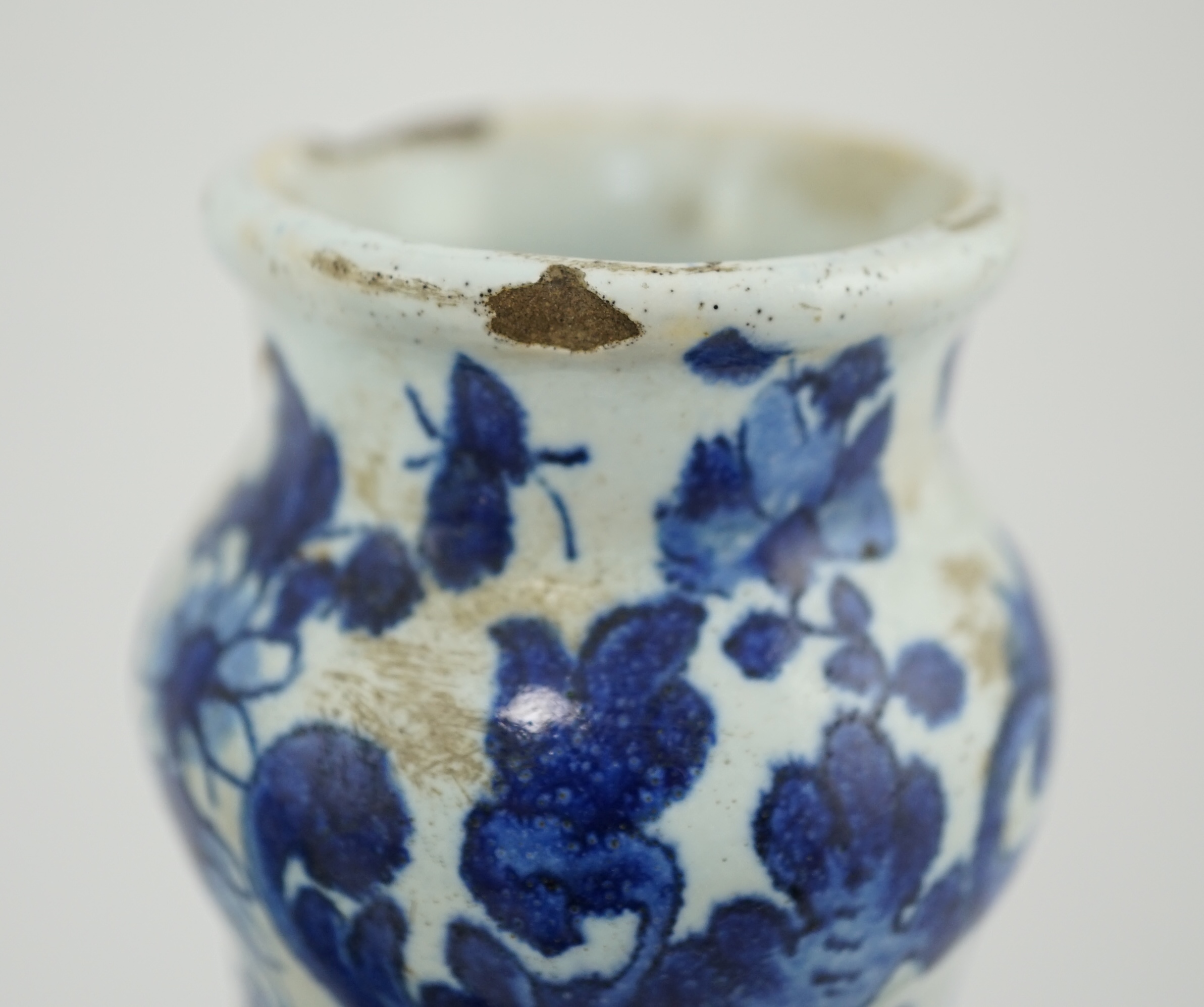 A pair of mid 18th century Delft blue and white flagons